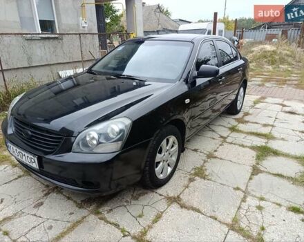 Чорний Кіа Маджентіс, об'ємом двигуна 2 л та пробігом 439 тис. км за 5400 $, фото 1 на Automoto.ua