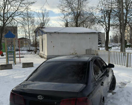 Черный Киа Маджентис, объемом двигателя 2.66 л и пробегом 305 тыс. км за 6200 $, фото 1 на Automoto.ua