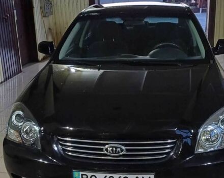 Чорний Кіа Маджентіс, об'ємом двигуна 2 л та пробігом 220 тис. км за 6300 $, фото 1 на Automoto.ua