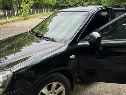 Чорний Кіа Маджентіс, об'ємом двигуна 2 л та пробігом 302 тис. км за 4500 $, фото 1 на Automoto.ua