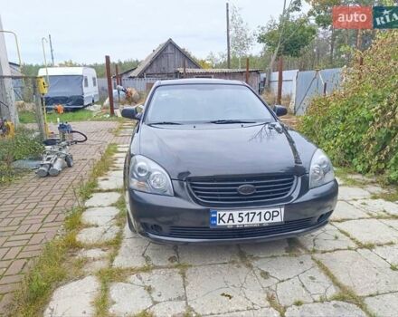 Черный Киа Маджентис, объемом двигателя 2 л и пробегом 439 тыс. км за 5400 $, фото 1 на Automoto.ua