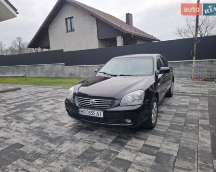 Чорний Кіа Маджентіс, об'ємом двигуна 2 л та пробігом 215 тис. км за 5300 $, фото 1 на Automoto.ua