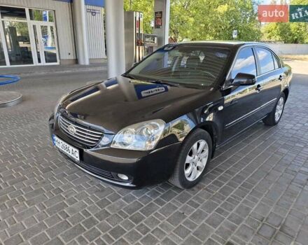 Чорний Кіа Маджентіс, об'ємом двигуна 2 л та пробігом 190 тис. км за 6600 $, фото 1 на Automoto.ua