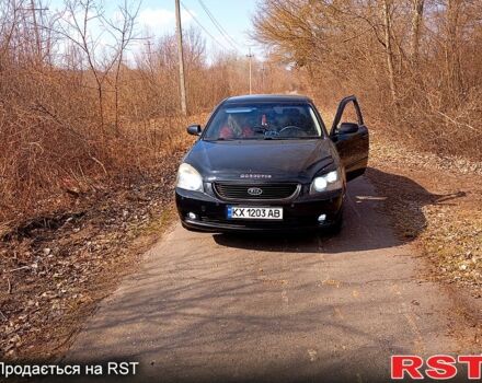 Чорний Кіа Маджентіс, об'ємом двигуна 2.7 л та пробігом 1 тис. км за 6000 $, фото 1 на Automoto.ua