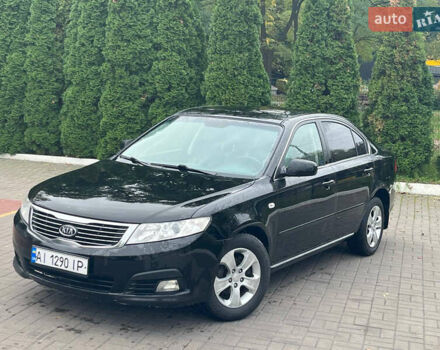 Чорний Кіа Маджентіс, об'ємом двигуна 2 л та пробігом 250 тис. км за 4950 $, фото 1 на Automoto.ua