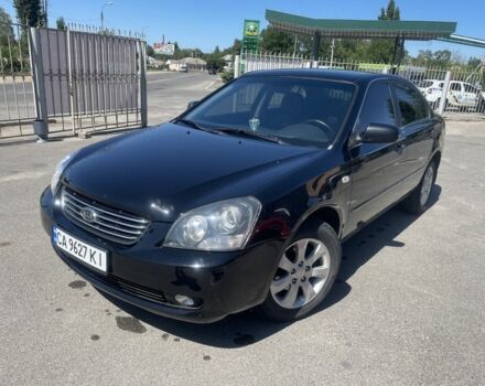Чорний Кіа Маджентіс, об'ємом двигуна 2 л та пробігом 271 тис. км за 4600 $, фото 1 на Automoto.ua