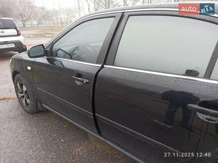 Чорний Кіа Маджентіс, об'ємом двигуна 2 л та пробігом 226 тис. км за 5500 $, фото 1 на Automoto.ua