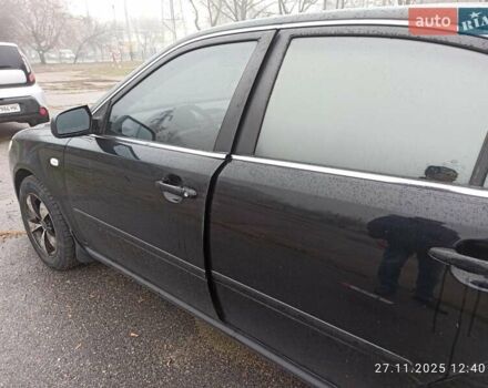 Чорний Кіа Маджентіс, об'ємом двигуна 2 л та пробігом 226 тис. км за 5500 $, фото 1 на Automoto.ua