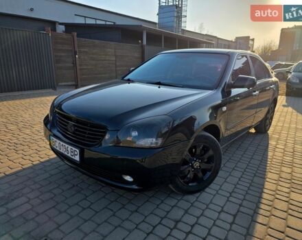 Чорний Кіа Маджентіс, об'ємом двигуна 2 л та пробігом 247 тис. км за 6300 $, фото 1 на Automoto.ua