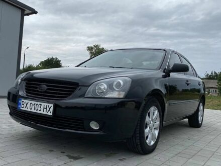 Чорний Кіа Маджентіс, об'ємом двигуна 2 л та пробігом 278 тис. км за 4200 $, фото 1 на Automoto.ua