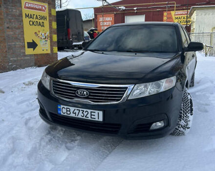 Чорний Кіа Маджентіс, об'ємом двигуна 2 л та пробігом 224 тис. км за 6500 $, фото 1 на Automoto.ua