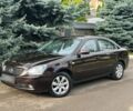 Фиолетовый Киа Маджентис, объемом двигателя 2 л и пробегом 107 тыс. км за 4000 $, фото 1 на Automoto.ua