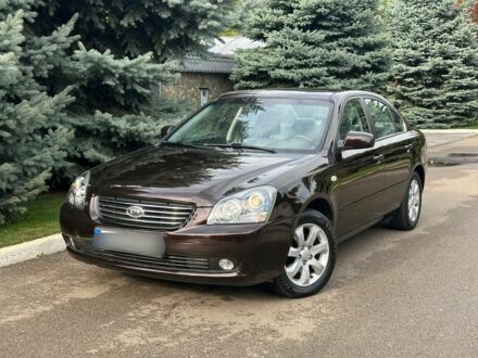 Кіа Маджентіс 2006 у Києві на Automoto.ua Фіолетовий Кіа Маджентіс, об'ємом двигуна 2 л та пробігом 107 тис. км за 4000 $, фото 1 на Automoto.ua