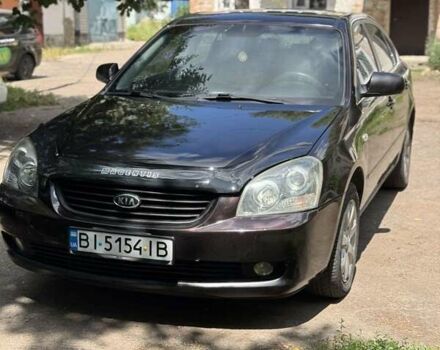 Фіолетовий Кіа Маджентіс, об'ємом двигуна 2 л та пробігом 211 тис. км за 5500 $, фото 1 на Automoto.ua