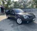 Коричневий Кіа Маджентіс, об'ємом двигуна 2 л та пробігом 310 тис. км за 5999 $, фото 4 на Automoto.ua