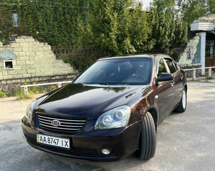 Коричневий Кіа Маджентіс, об'ємом двигуна 2 л та пробігом 310 тис. км за 6200 $, фото 2 на Automoto.ua