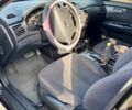 Коричневий Кіа Маджентіс, об'ємом двигуна 2 л та пробігом 310 тис. км за 5999 $, фото 8 на Automoto.ua
