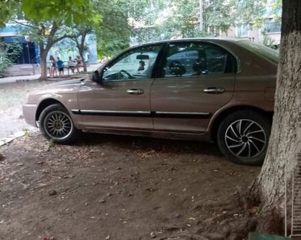 Коричневий Кіа Маджентіс, об'ємом двигуна 2 л та пробігом 160 тис. км за 3000 $, фото 4 на Automoto.ua