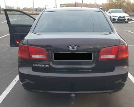 Коричневий Кіа Маджентіс, об'ємом двигуна 2 л та пробігом 278 тис. км за 5800 $, фото 7 на Automoto.ua