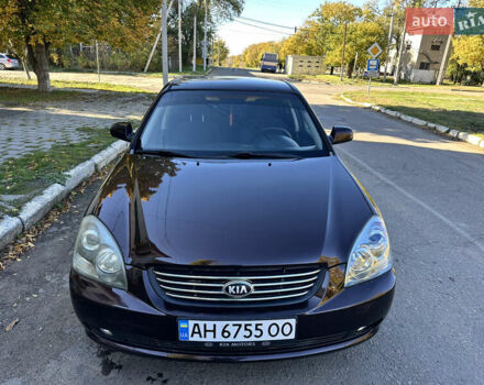 Коричневий Кіа Маджентіс, об'ємом двигуна 2 л та пробігом 191 тис. км за 4900 $, фото 2 на Automoto.ua