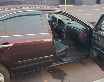 Коричневий Кіа Маджентіс, об'ємом двигуна 2 л та пробігом 278 тис. км за 5800 $, фото 5 на Automoto.ua