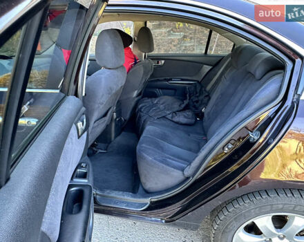 Коричневий Кіа Маджентіс, об'ємом двигуна 2 л та пробігом 191 тис. км за 4900 $, фото 16 на Automoto.ua