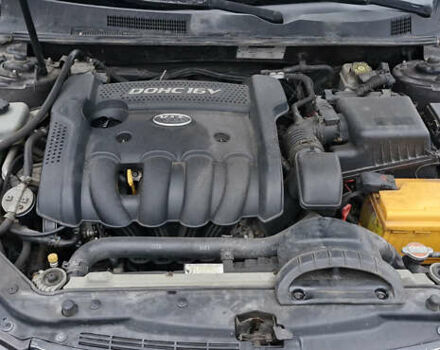 Коричневий Кіа Маджентіс, об'ємом двигуна 2 л та пробігом 458 тис. км за 4900 $, фото 9 на Automoto.ua