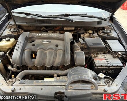 Коричневий Кіа Маджентіс, об'ємом двигуна 2 л та пробігом 251 тис. км за 3500 $, фото 8 на Automoto.ua