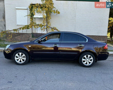 Коричневий Кіа Маджентіс, об'ємом двигуна 2 л та пробігом 191 тис. км за 4900 $, фото 4 на Automoto.ua