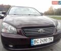 Коричневий Кіа Маджентіс, об'ємом двигуна 2 л та пробігом 241 тис. км за 4800 $, фото 1 на Automoto.ua