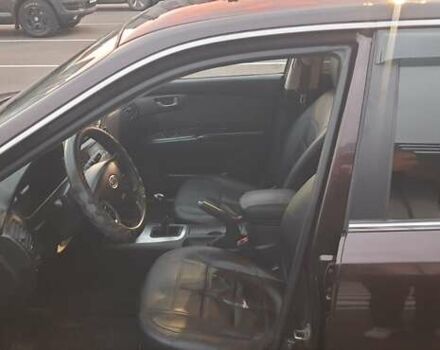 Коричневий Кіа Маджентіс, об'ємом двигуна 2 л та пробігом 278 тис. км за 5800 $, фото 1 на Automoto.ua