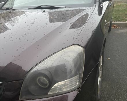 Коричневий Кіа Маджентіс, об'ємом двигуна 2 л та пробігом 355 тис. км за 4500 $, фото 6 на Automoto.ua