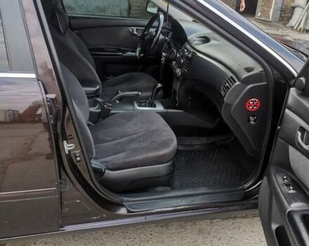 Коричневий Кіа Маджентіс, об'ємом двигуна 2 л та пробігом 240 тис. км за 3999 $, фото 2 на Automoto.ua