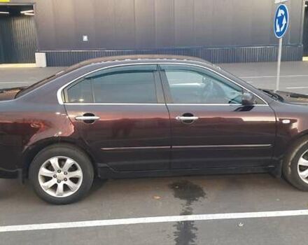 Коричневий Кіа Маджентіс, об'ємом двигуна 2 л та пробігом 278 тис. км за 5800 $, фото 4 на Automoto.ua