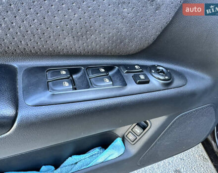 Коричневий Кіа Маджентіс, об'ємом двигуна 2 л та пробігом 191 тис. км за 4900 $, фото 13 на Automoto.ua