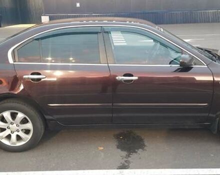 Коричневий Кіа Маджентіс, об'ємом двигуна 2 л та пробігом 278 тис. км за 5800 $, фото 9 на Automoto.ua