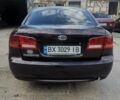 Коричневий Кіа Маджентіс, об'ємом двигуна 2 л та пробігом 240 тис. км за 3999 $, фото 1 на Automoto.ua