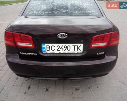 Коричневий Кіа Маджентіс, об'ємом двигуна 2 л та пробігом 241 тис. км за 4800 $, фото 1 на Automoto.ua