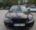 Коричневий Кіа Маджентіс, об'ємом двигуна 2 л та пробігом 240 тис. км за 3999 $, фото 4 на Automoto.ua