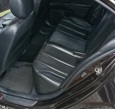 Коричневий Кіа Маджентіс, об'ємом двигуна 2 л та пробігом 458 тис. км за 4900 $, фото 7 на Automoto.ua