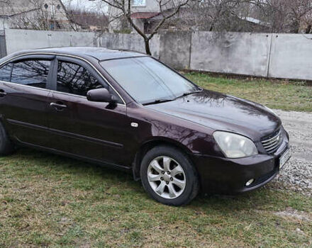 Коричневий Кіа Маджентіс, об'ємом двигуна 2 л та пробігом 458 тис. км за 4900 $, фото 1 на Automoto.ua