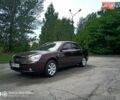 Коричневый Киа Маджентис, объемом двигателя 2 л и пробегом 290 тыс. км за 6300 $, фото 1 на Automoto.ua