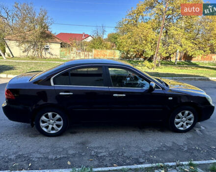 Коричневий Кіа Маджентіс, об'ємом двигуна 2 л та пробігом 191 тис. км за 4900 $, фото 8 на Automoto.ua
