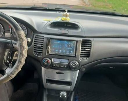 Коричневий Кіа Маджентіс, об'ємом двигуна 2 л та пробігом 278 тис. км за 5800 $, фото 19 на Automoto.ua