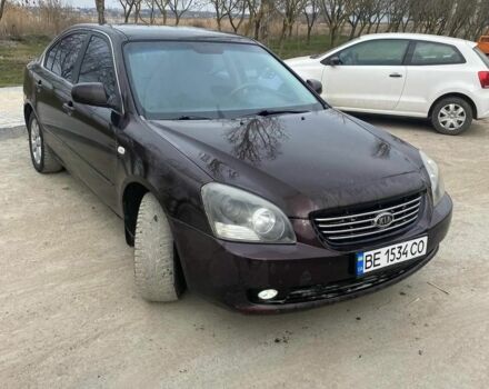 Коричневий Кіа Маджентіс, об'ємом двигуна 2 л та пробігом 199 тис. км за 4250 $, фото 1 на Automoto.ua