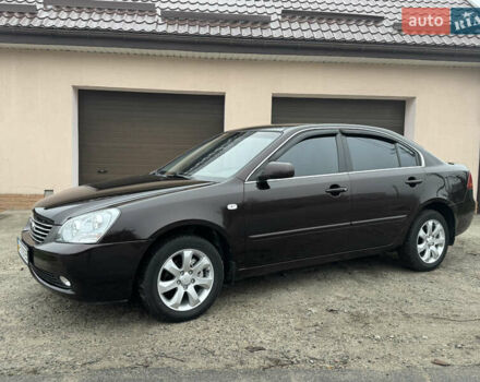 Коричневий Кіа Маджентіс, об'ємом двигуна 2 л та пробігом 157 тис. км за 5900 $, фото 2 на Automoto.ua