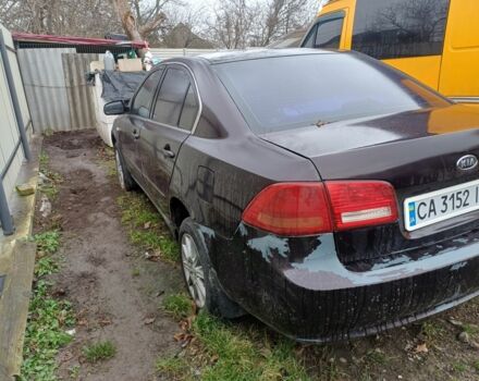 Коричневий Кіа Маджентіс, об'ємом двигуна 2 л та пробігом 200 тис. км за 2700 $, фото 2 на Automoto.ua