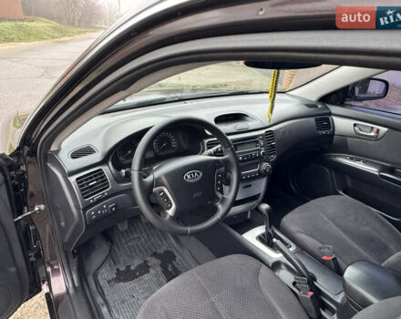 Коричневий Кіа Маджентіс, об'ємом двигуна 2 л та пробігом 157 тис. км за 5900 $, фото 22 на Automoto.ua