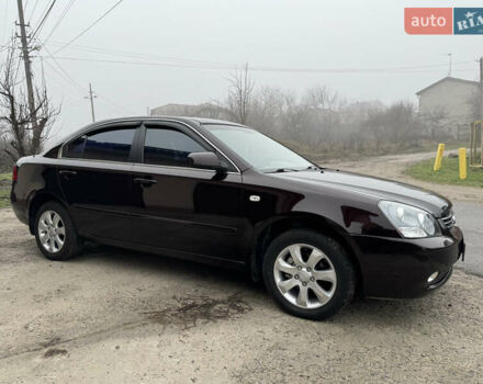 Коричневий Кіа Маджентіс, об'ємом двигуна 2 л та пробігом 157 тис. км за 5900 $, фото 10 на Automoto.ua