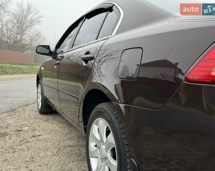 Коричневий Кіа Маджентіс, об'ємом двигуна 2 л та пробігом 157 тис. км за 5900 $, фото 14 на Automoto.ua